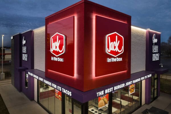 Jack in the Box restaurant exterior at night, showcasing signage and illuminated branding for late-night dining.