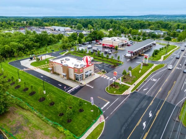 Aerial view of Drive-In Fast Food Restaurant with adjacent parking, highlighting accessible location and modern design.