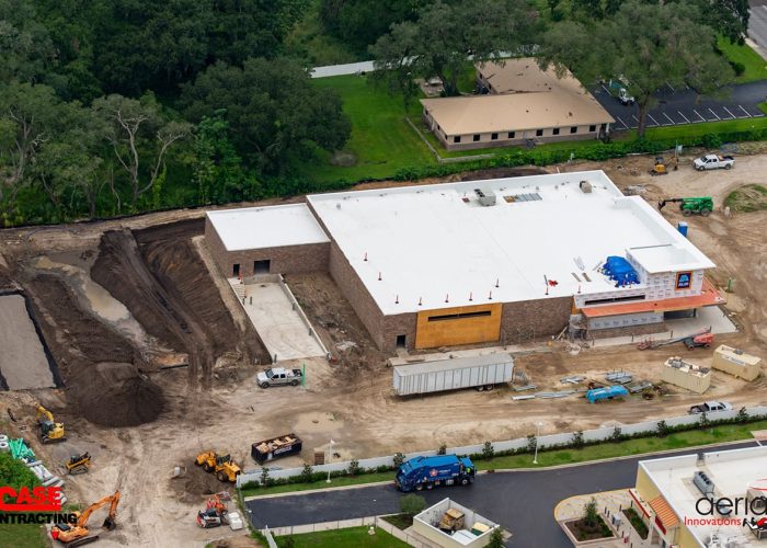 Aerial view of Case Contracting's construction site for a new ALDI store, showing building progress and heavy machinery.