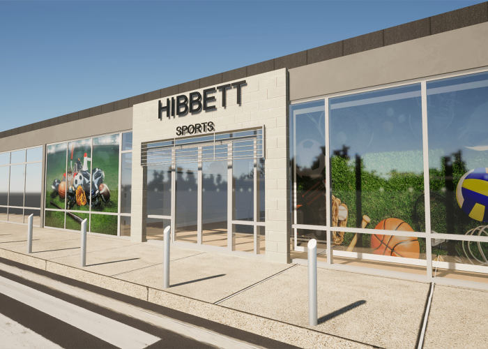 Exterior view of Hibbett Sports store showcasing sports equipment on large window displays.