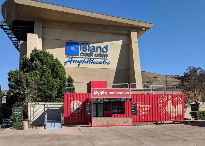 Art Bird Fried Chicken stand outside North Island Credit Union Amphitheatre on a sunny day.